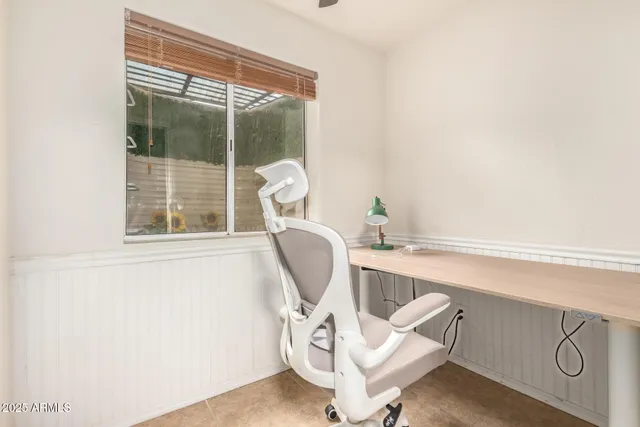 a room with a window and gym equipment
