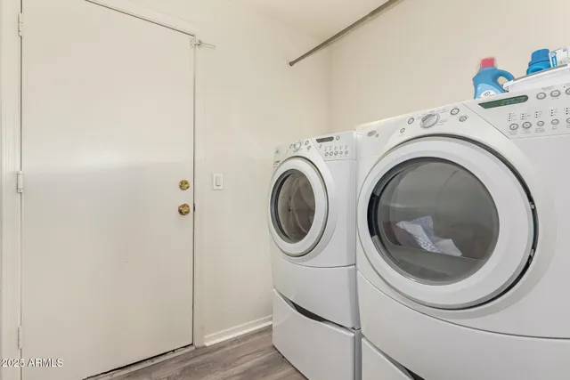a utility room with dryer and washer