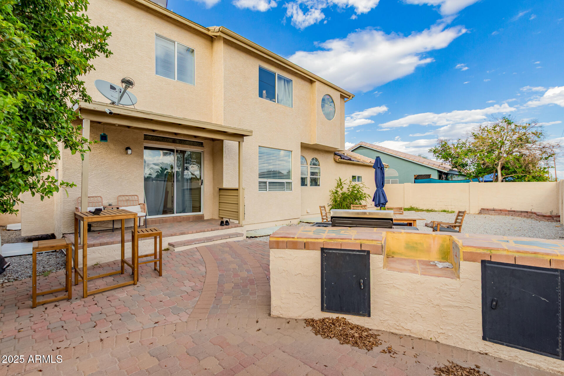 1691 East Gary Drive Chandler, AZ 85225 - Photo 44 of 45 a view of a patio with swimming pool table and chairs