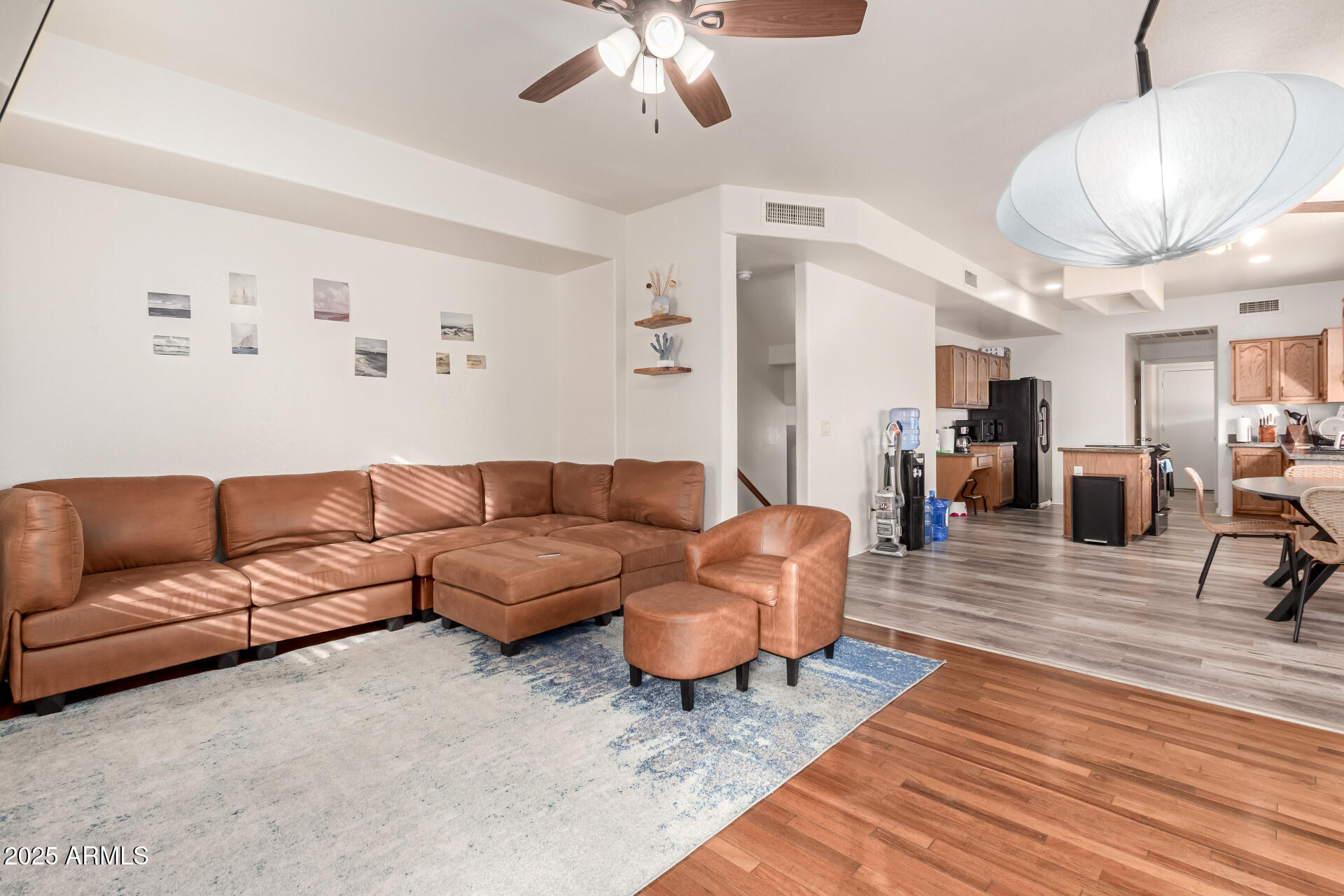 1691 East Gary Drive Chandler, AZ 85225 - Photo 7 of 45 a living room with furniture and a wooden floor