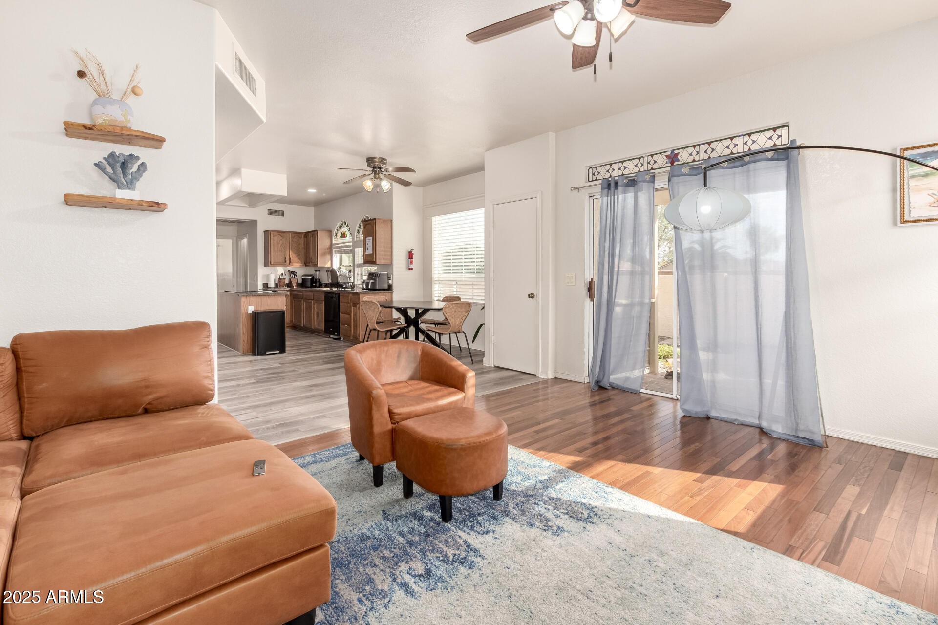 1691 East Gary Drive Chandler, AZ 85225 - Photo 8 of 45 a living room with furniture and a wooden floor
