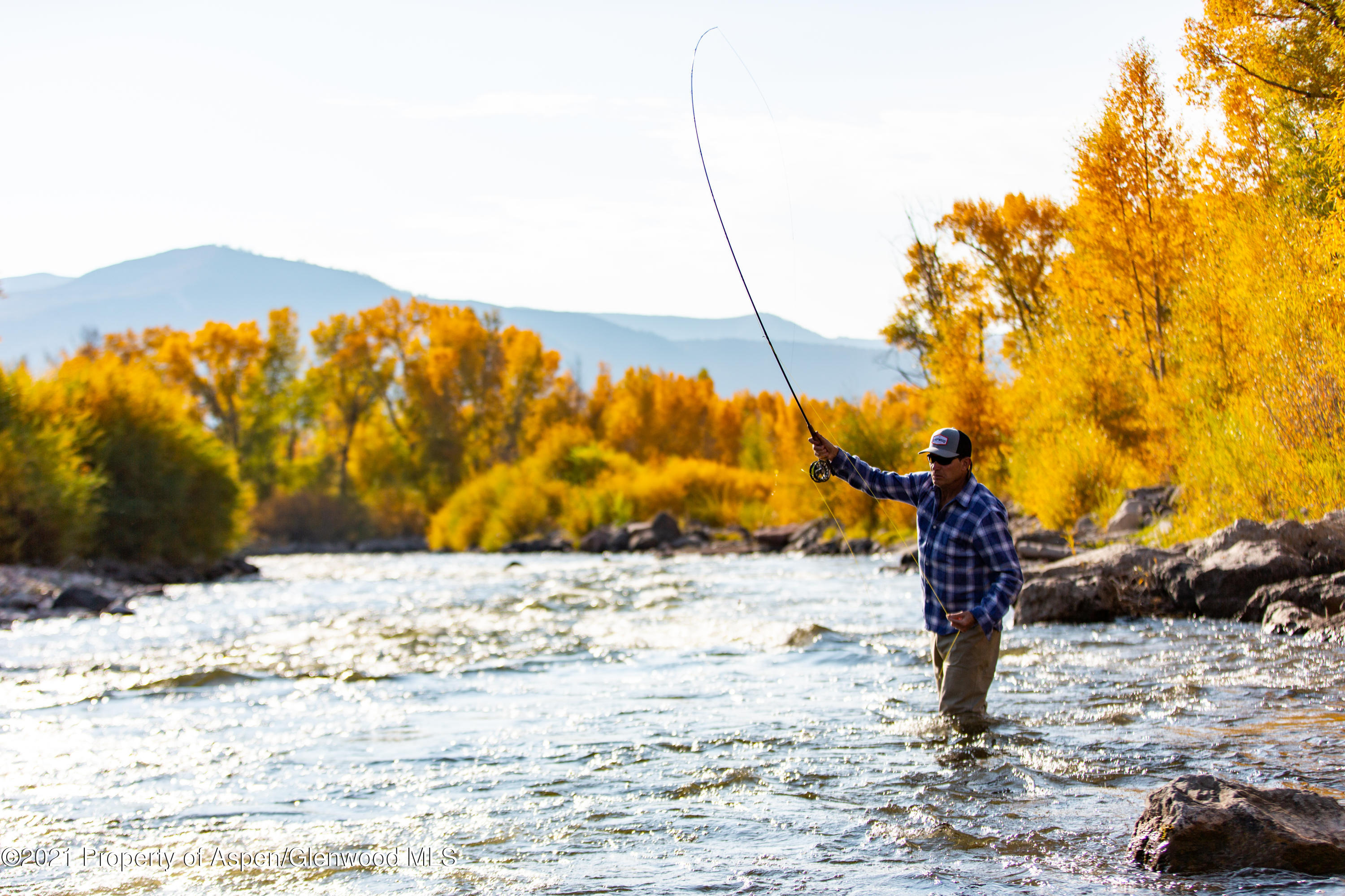 22856 Two Rivers Road, Unit R4 Basalt, CO 81621 - Photo 9 of 12 Fishing on the Roaring Fork
