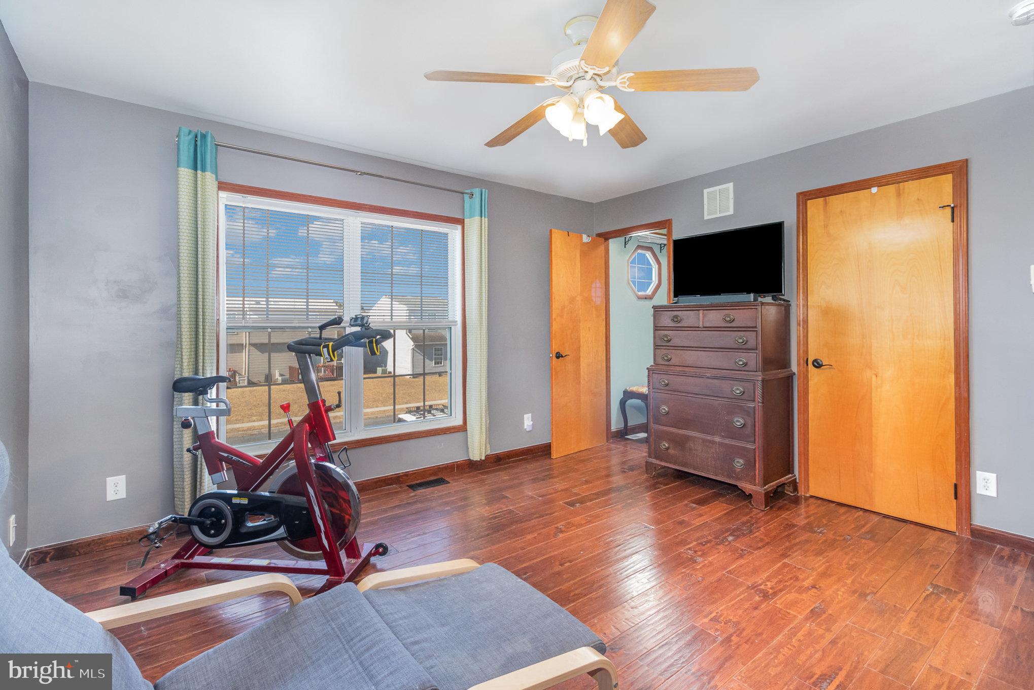 48 Tory Circle Enola, PA 17025 - Photo 11 of 26 a view of a room with gym equipment and windows