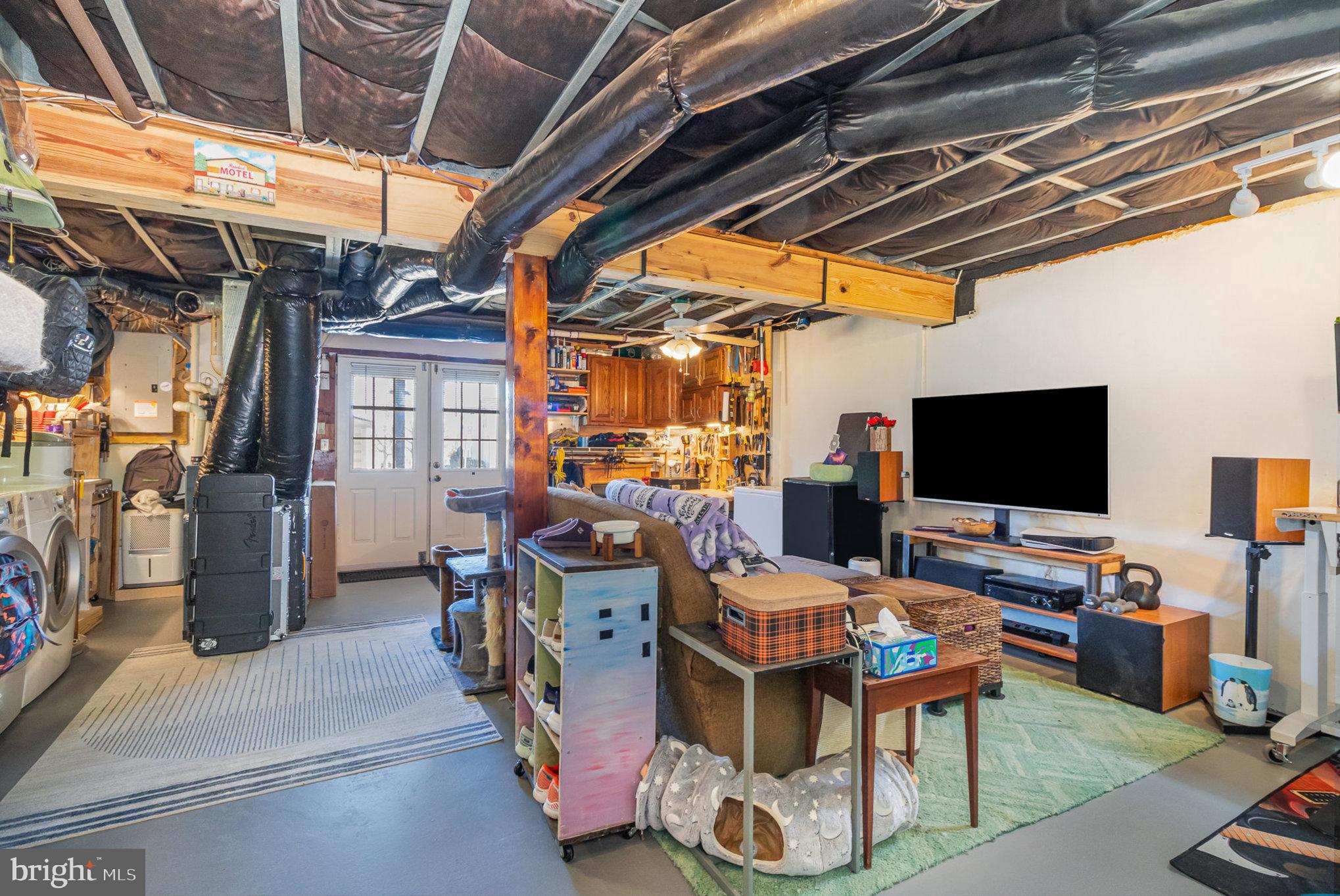 48 Tory Circle Enola, PA 17025 - Photo 18 of 26 a work room with furniture and a flat screen tv