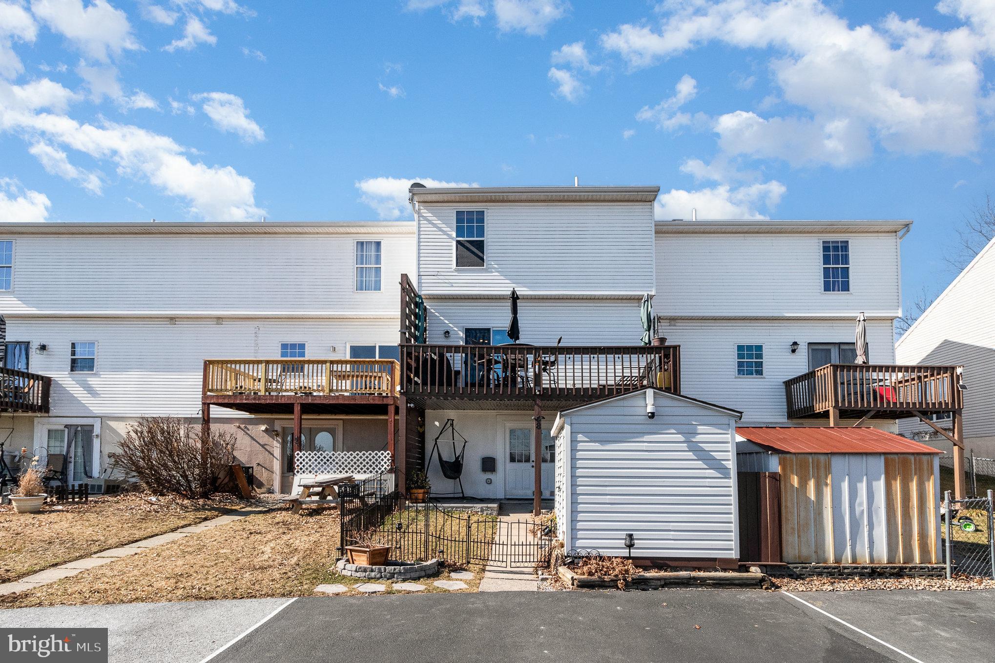 48 Tory Circle Enola, PA 17025 - Photo 22 of 26 a view of a patio with table and chairs