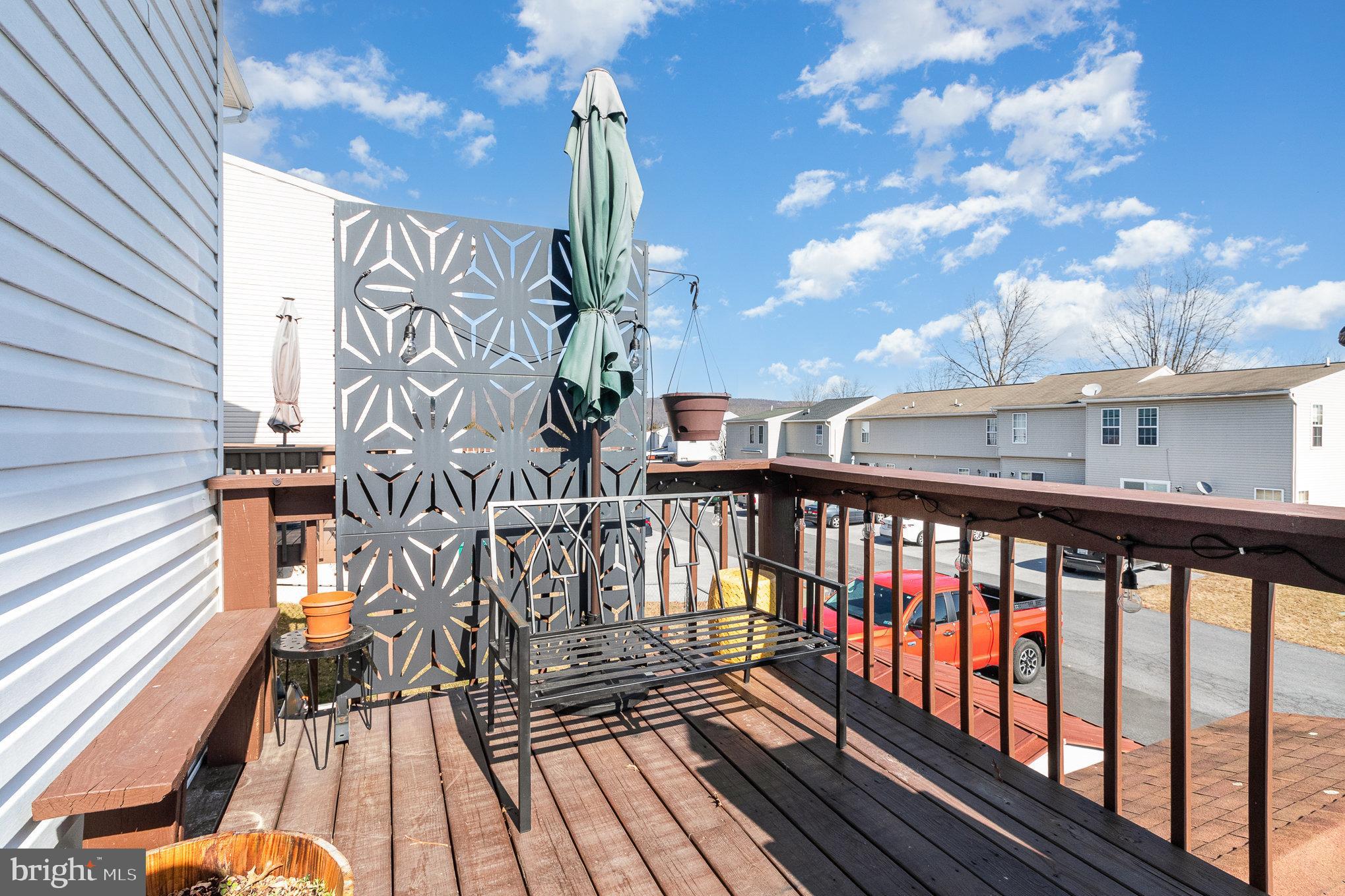 48 Tory Circle Enola, PA 17025 - Photo 25 of 26 a view of a balcony with wooden floor and iron fence