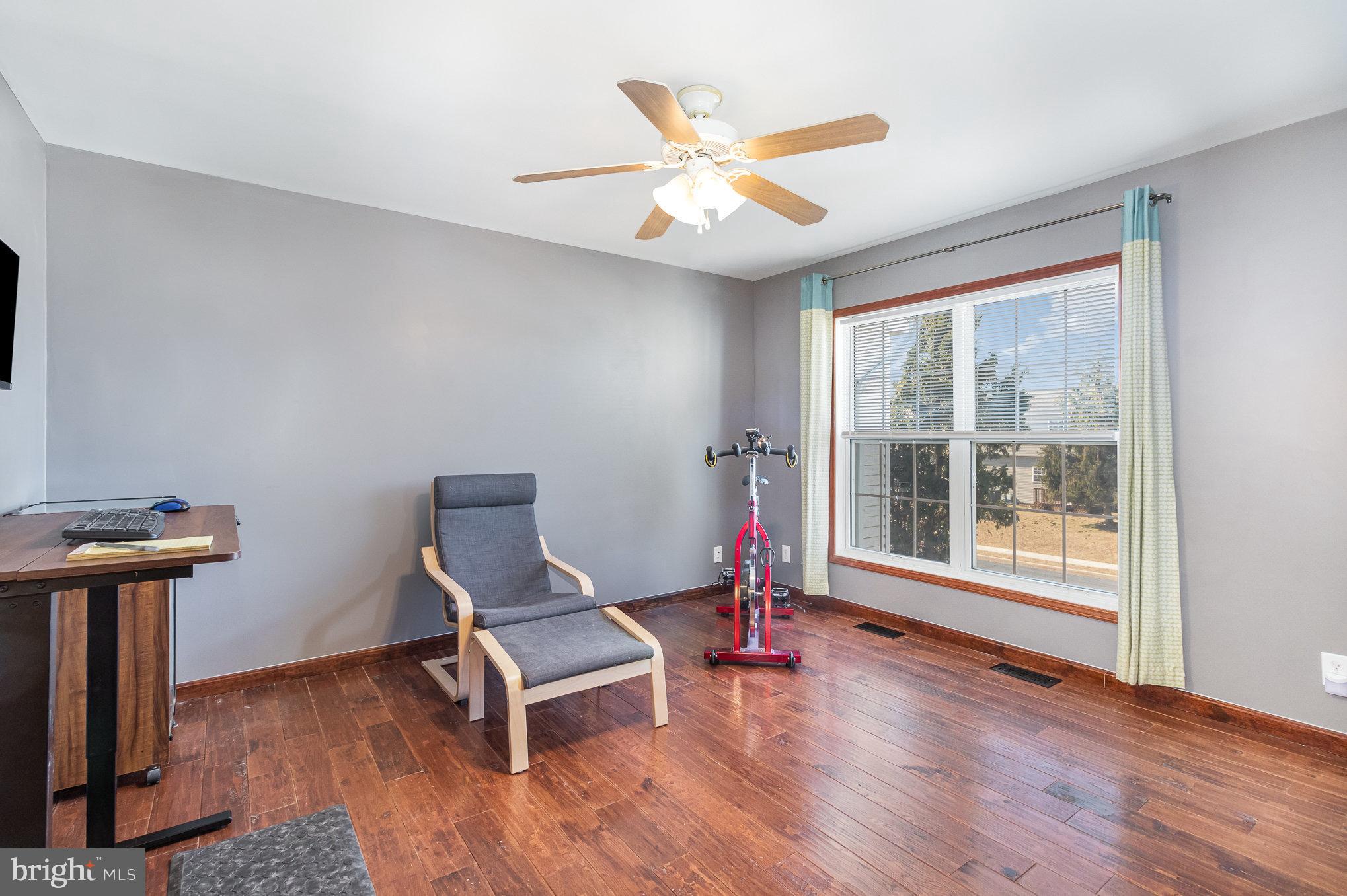 48 Tory Circle Enola, PA 17025 - Photo 10 of 26 a living room with a window and wooden floor