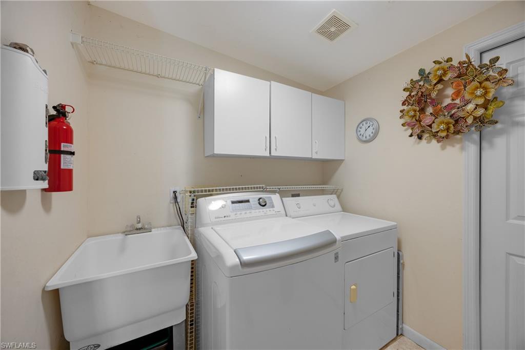 736 92nd Avenue North Naples, FL 34108 - Photo 16 of 25 a utility room with dryer and washer