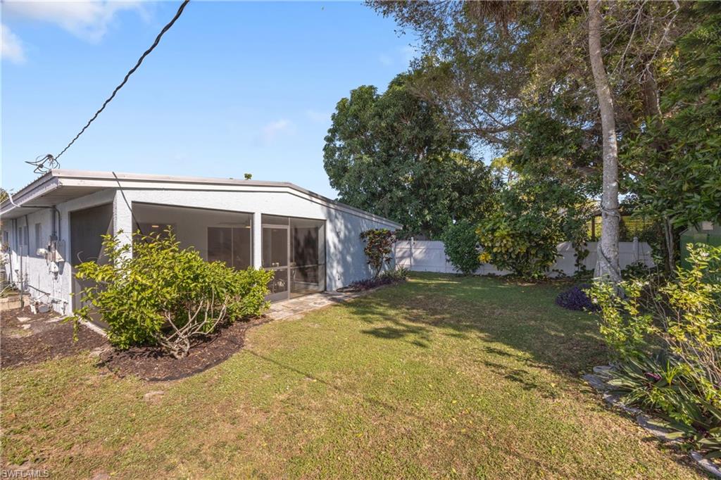 736 92nd Avenue North Naples, FL 34108 - Photo 24 of 25 a front view of house with yard