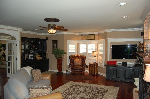 2724 Wendy Road Naperville, IL 60565 - Photo 2 of 16 a living room with furniture and a flat screen tv
