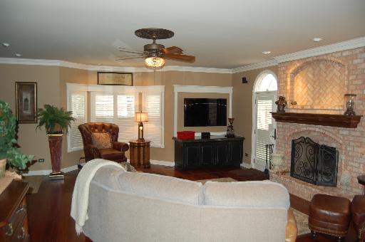 2724 Wendy Road Naperville, IL 60565 - Photo 3 of 16 a living room with furniture and a flat screen tv