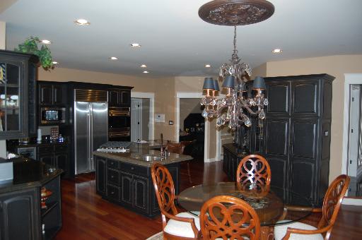 2724 Wendy Road Naperville, IL 60565 - Photo 6 of 16 a room with furniture a chandelier a rug and a chandelier