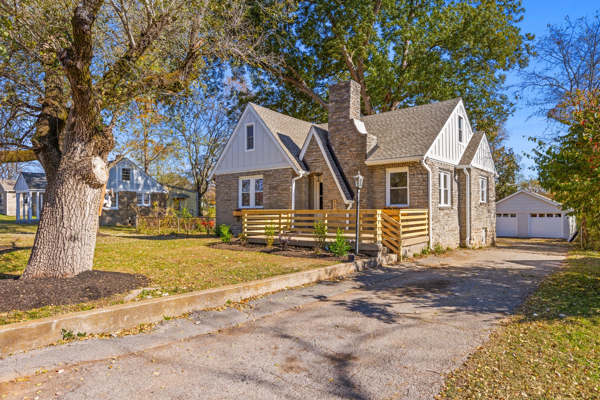 827 Argle Avenue Madison, TN 37115 - Photo 1 of 35 a front view of a house with a yard and garage