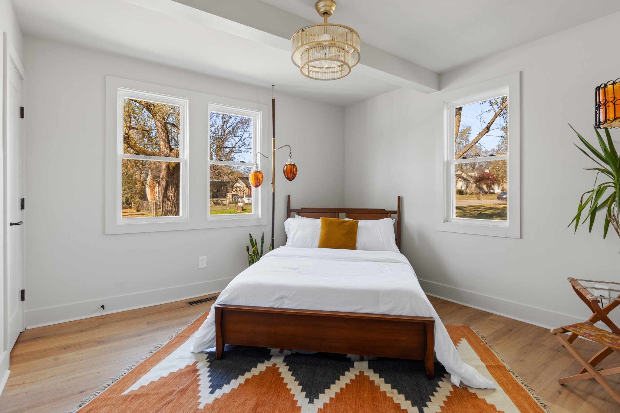 827 Argle Avenue Madison, TN 37115 - Photo 17 of 35 a bedroom with a bed and a table in it