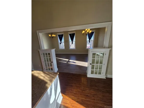 a dining room with furniture and a fireplace