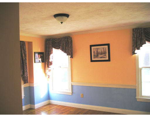 10 Chapelgate Road Canton, MA 02021 - Photo 6 of 11 a view of bedroom with window and wooden floor