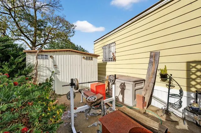 view of an outdoor sitting area with chairs