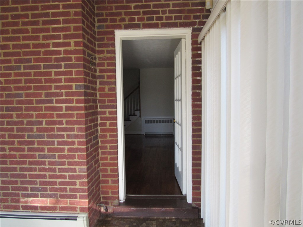 5313 Coxson Road Sandston, VA 23150 - Photo 11 of 27 Looking into living room from sun room.