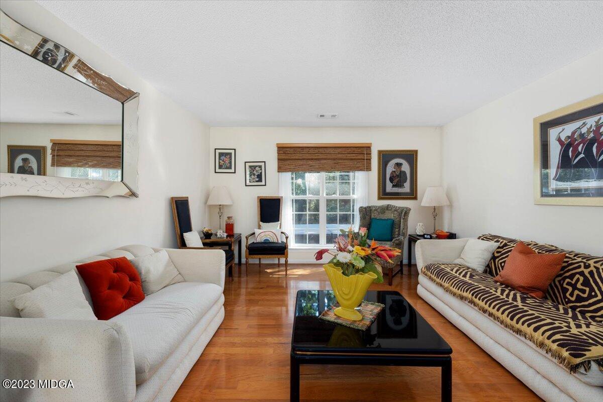 239 Altman Road Gray, GA 31032 - Photo 13 of 46 a living room with furniture fireplace and a window