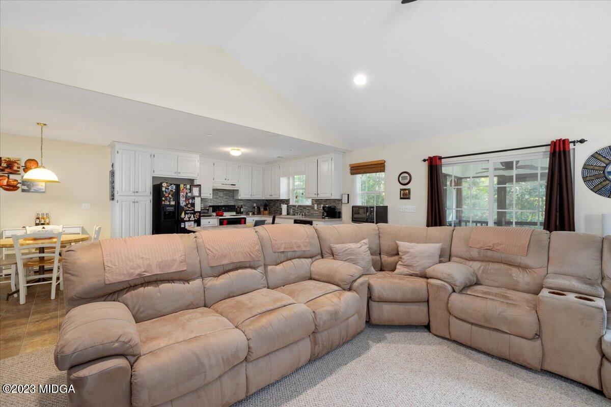 239 Altman Road Gray, GA 31032 - Photo 3 of 46 a living room with furniture and a large window