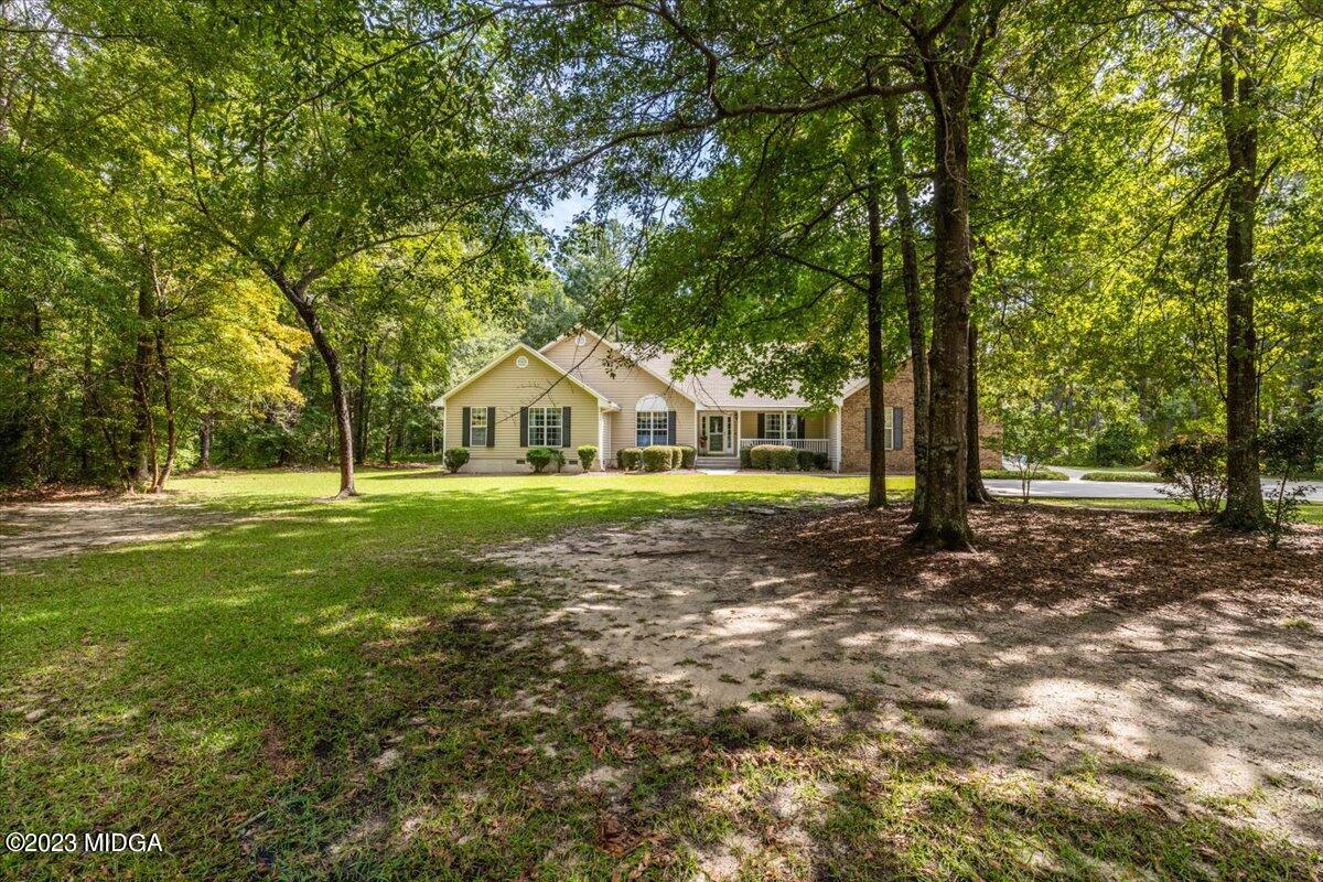 239 Altman Road Gray, GA 31032 - Photo 32 of 46 a view of a house with a yard