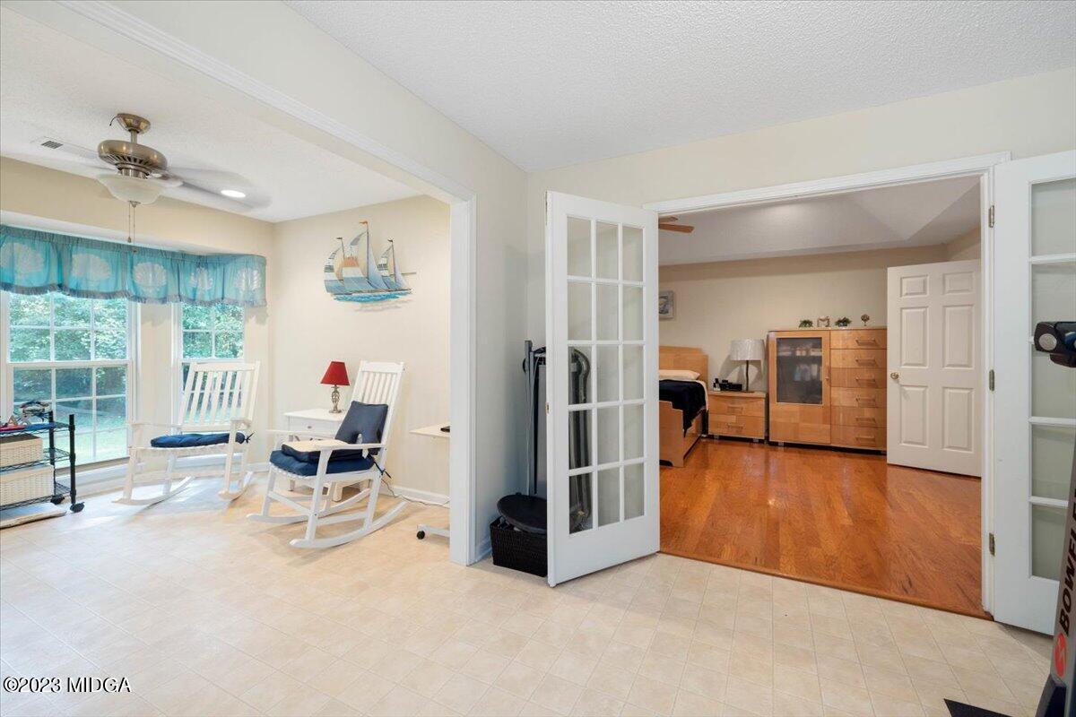 239 Altman Road Gray, GA 31032 - Photo 36 of 46 a view of a livingroom with furniture and an empty room