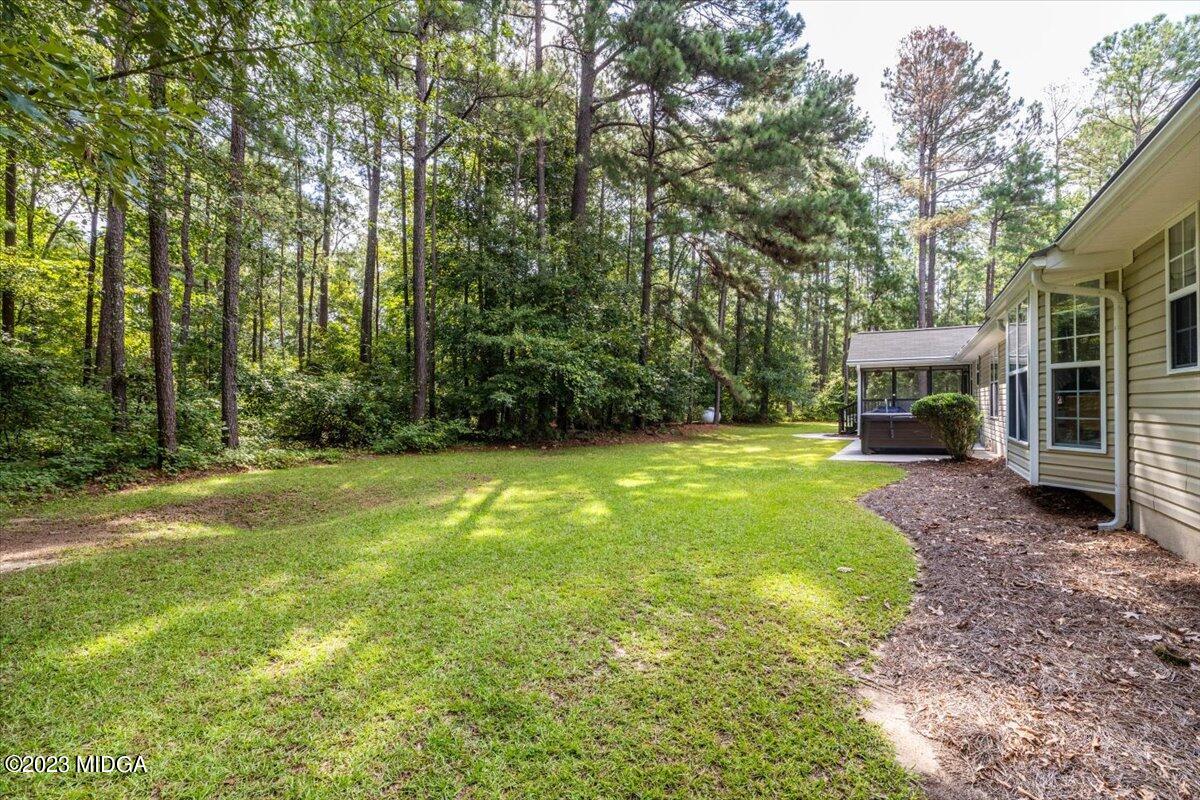 239 Altman Road Gray, GA 31032 - Photo 41 of 46 a view of a yard with plants and trees