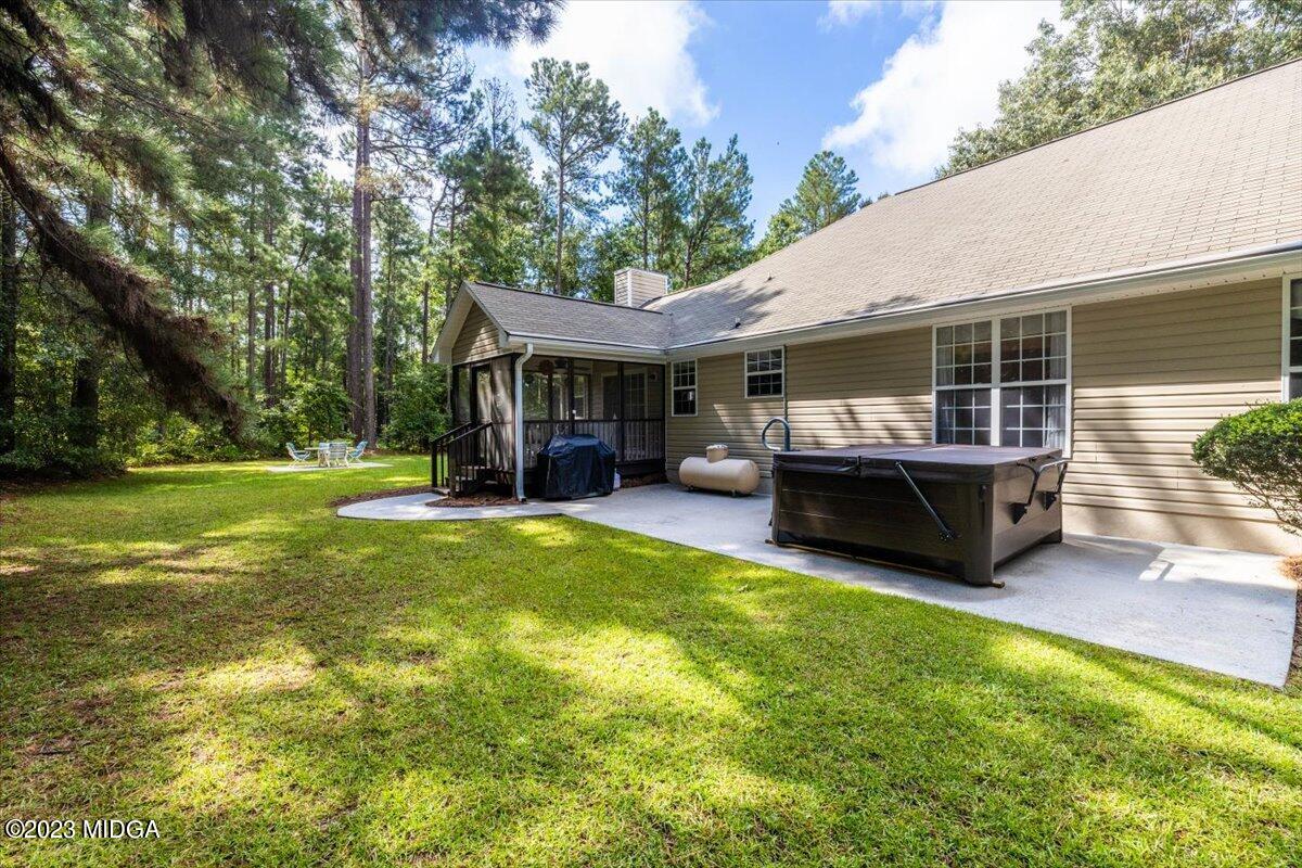 239 Altman Road Gray, GA 31032 - Photo 44 of 46 a view of a house with backyard porch and sitting area