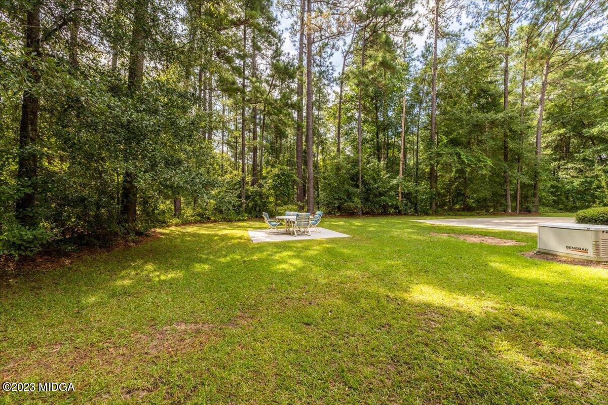 239 Altman Road Gray, GA 31032 - Photo 46 of 46 a view of swimming pool with an outdoor space and seating area