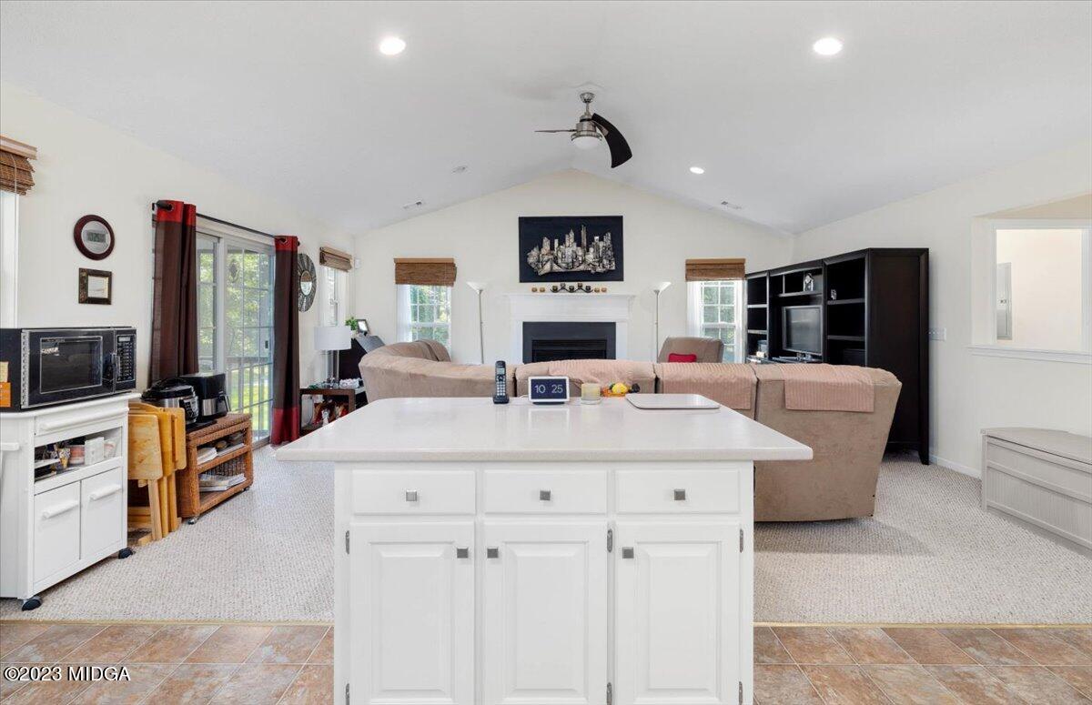 239 Altman Road Gray, GA 31032 - Photo 5 of 46 a large white kitchen with sink stove and refrigerator