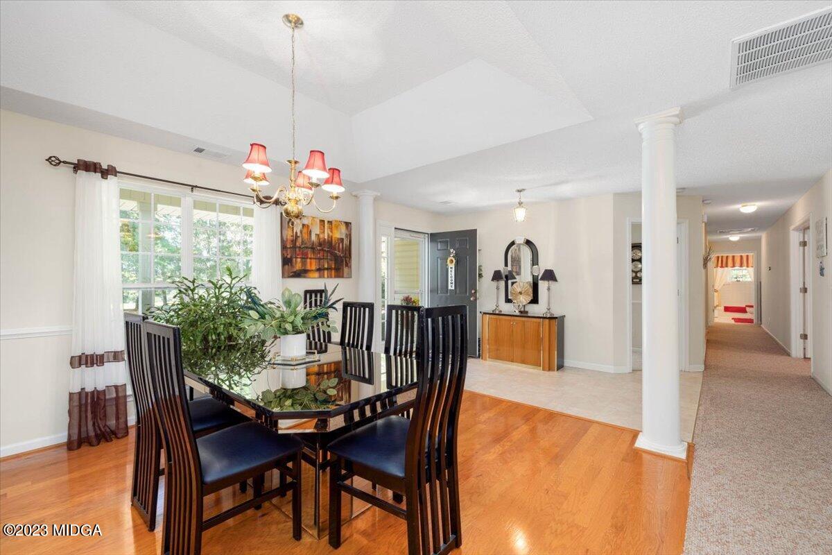 239 Altman Road Gray, GA 31032 - Photo 10 of 46 a dining room with furniture and window