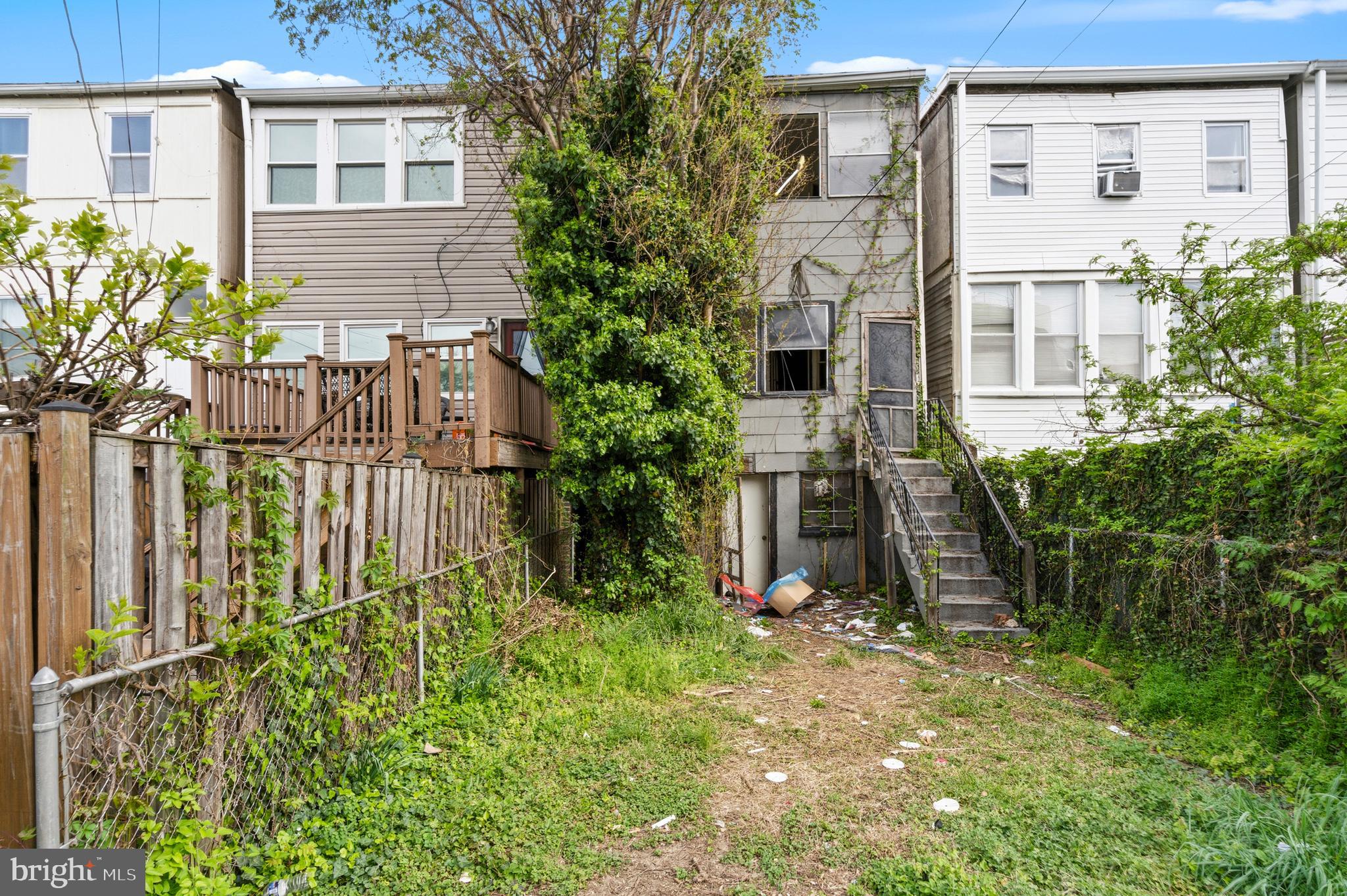 325 Bryant Street Northeast Washington, DC 20002 - Photo 23 of 28 a view of a house with a small yard and plants