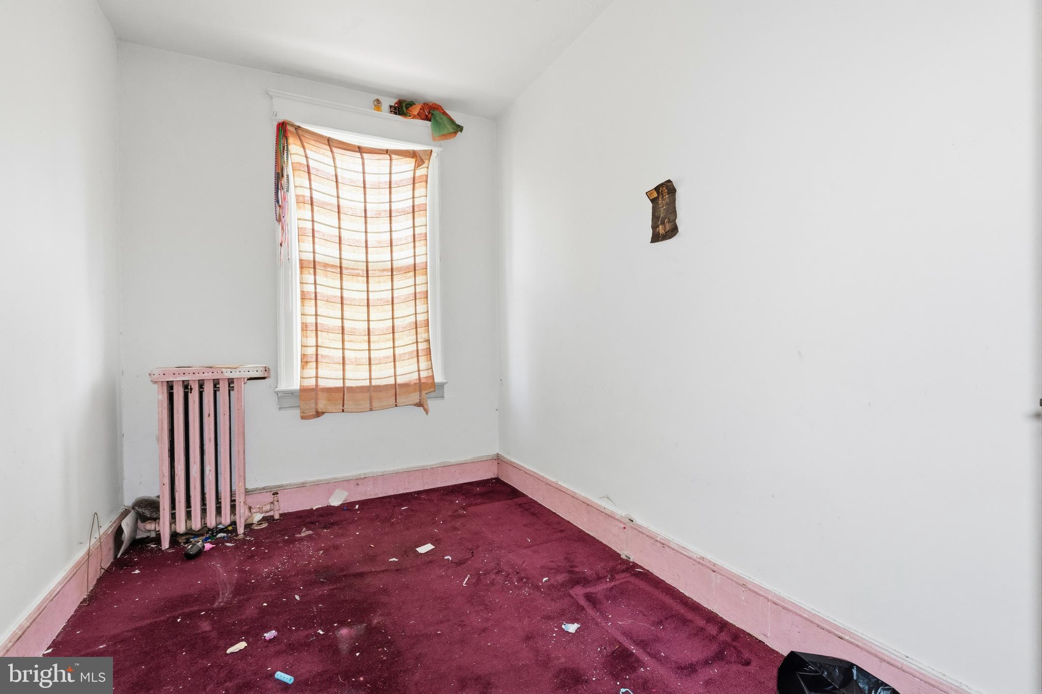 325 Bryant Street Northeast Washington, DC 20002 - Photo 9 of 28 an empty room with a window