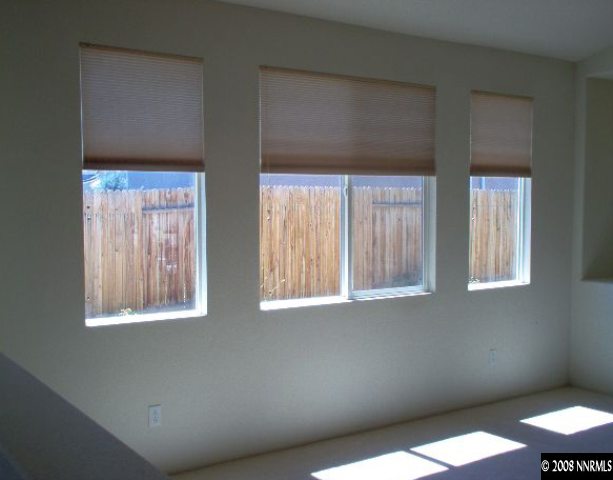 1420 Diamond Country Drive Reno, NV 89521 - Photo 3 of 4 a view of an empty room with a window