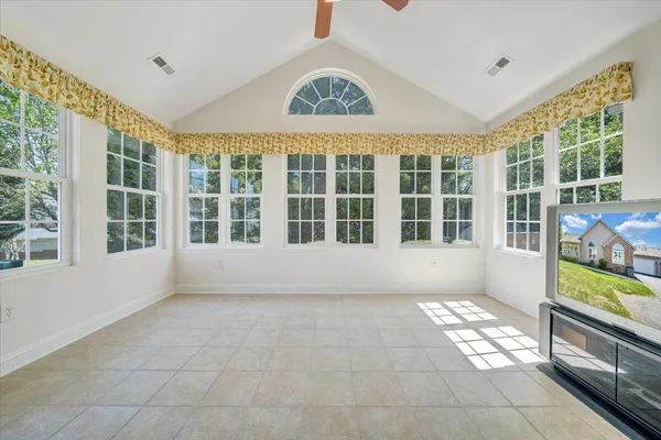 a view of a kitchen with a sink and cabinets