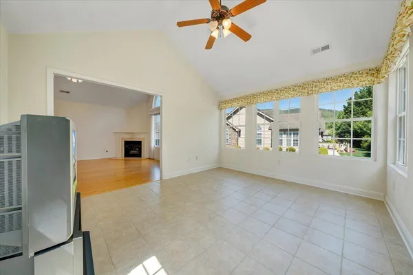 a kitchen with granite countertop a sink stainless steel appliances and cabinets