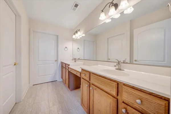a kitchen with stainless steel appliances granite countertop a stove and a sink