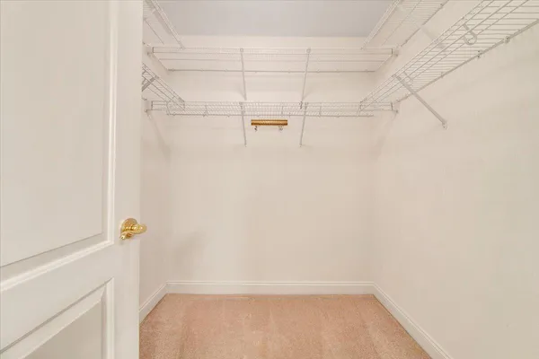 a very nice looking dining room with a large window and dining table