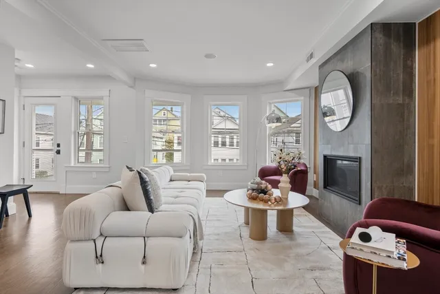 a living room with furniture and a window