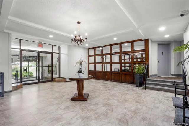 a view of an empty room with windows