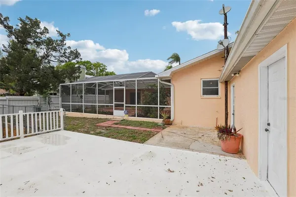a view of a kitchen and microwave