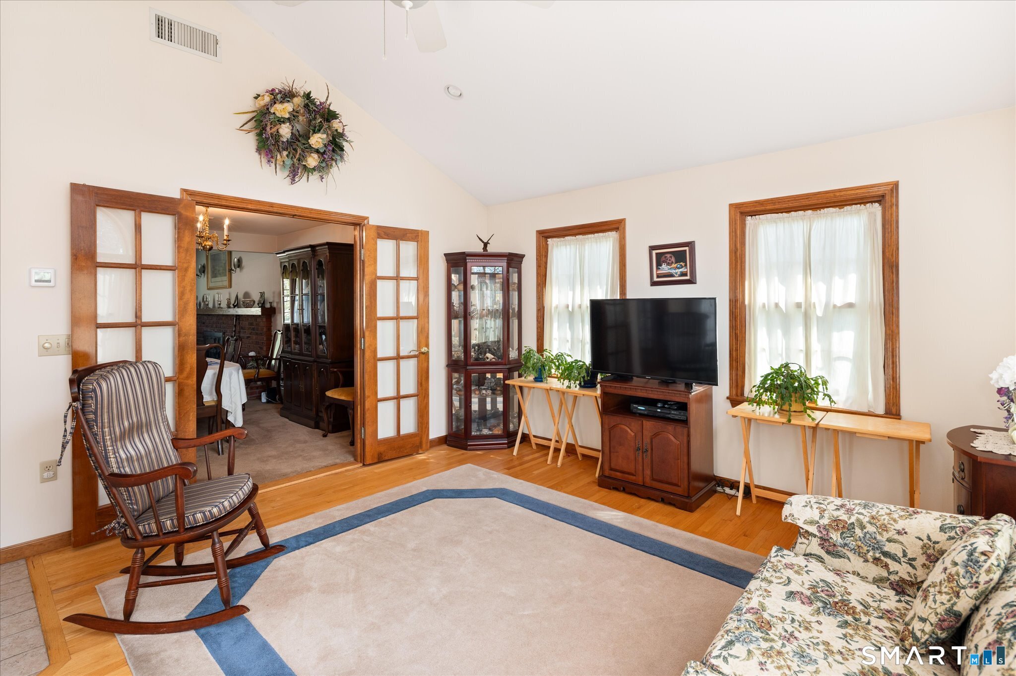 100 Bette Circle Vernon, CT 06066 - Photo 13 of 32 a living room with furniture and a flat screen tv