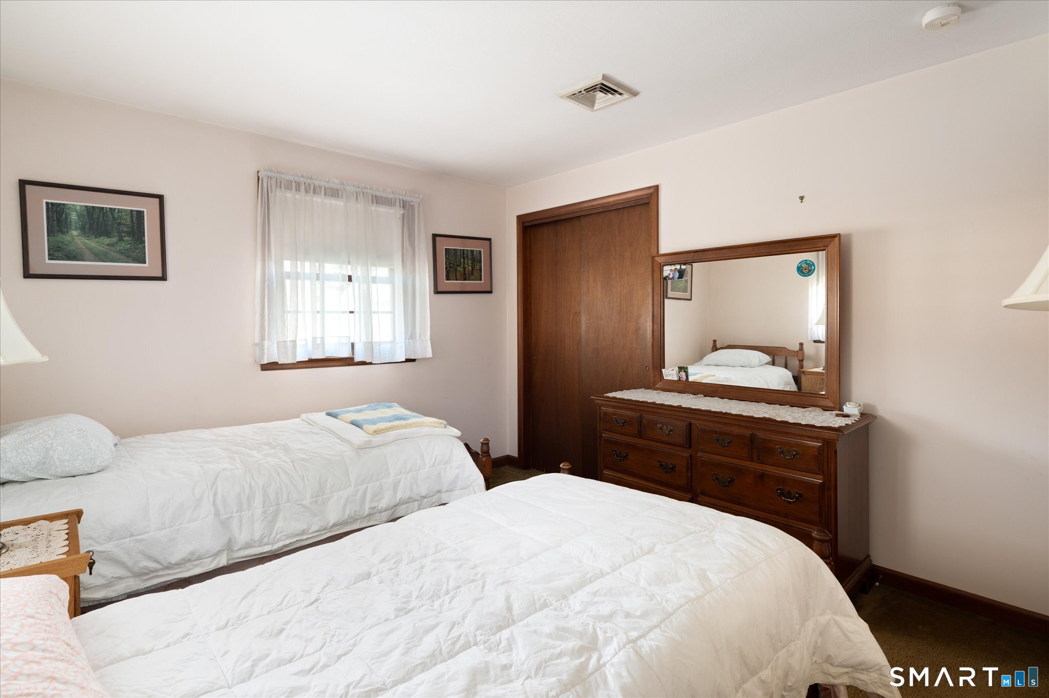 100 Bette Circle Vernon, CT 06066 - Photo 26 of 32 a bedroom with a bed and wooden floor