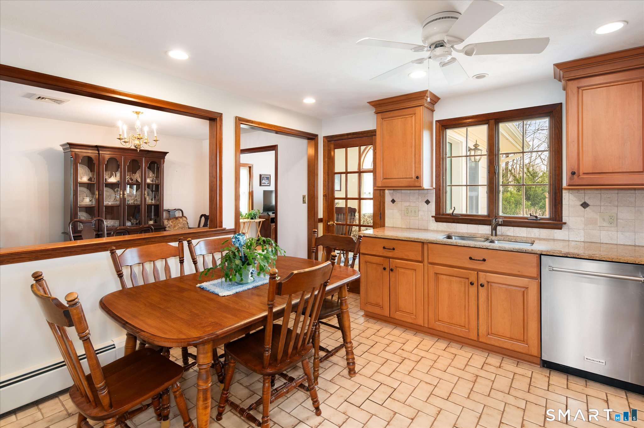 100 Bette Circle Vernon, CT 06066 - Photo 9 of 32 a view of a dining room with furniture window and wooden floor