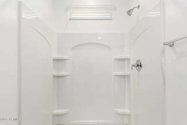 a close view of a shower in the bathroom