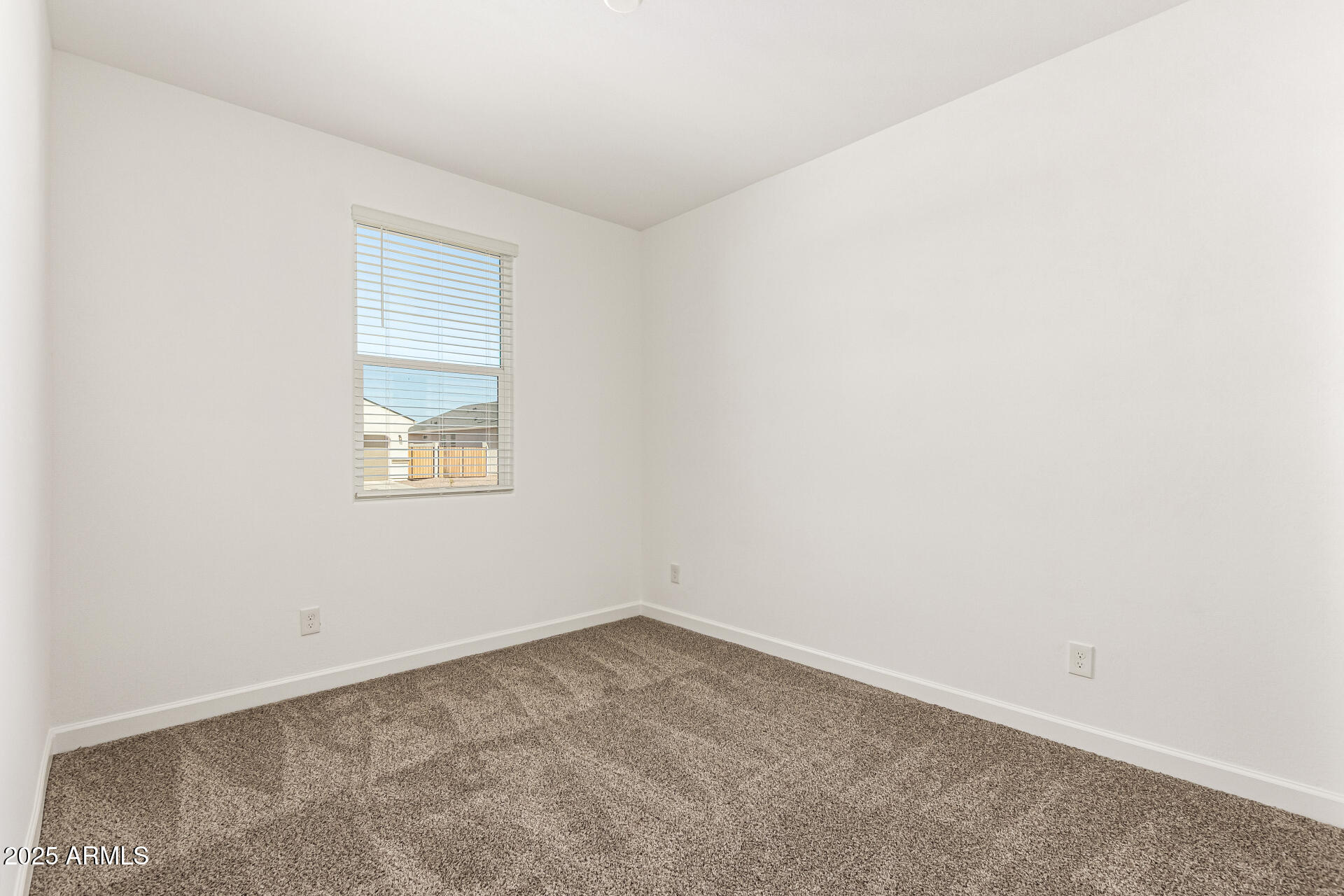 5507 East Mearn Road San Tan Valley, AZ 85140 - Photo 16 of 30 an empty room with a window
