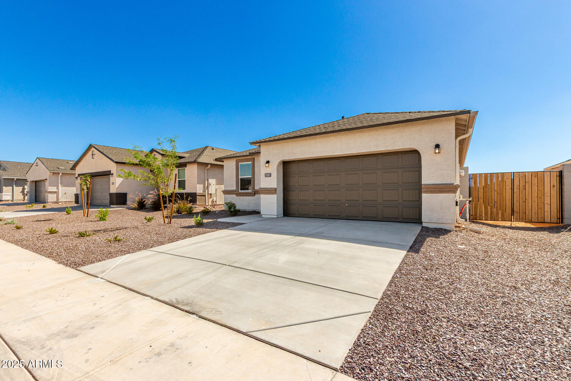 5507 East Mearn Road San Tan Valley, AZ 85140 - Photo 2 of 30 a view of house with outdoor space and seating area