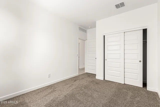 an empty room with closet