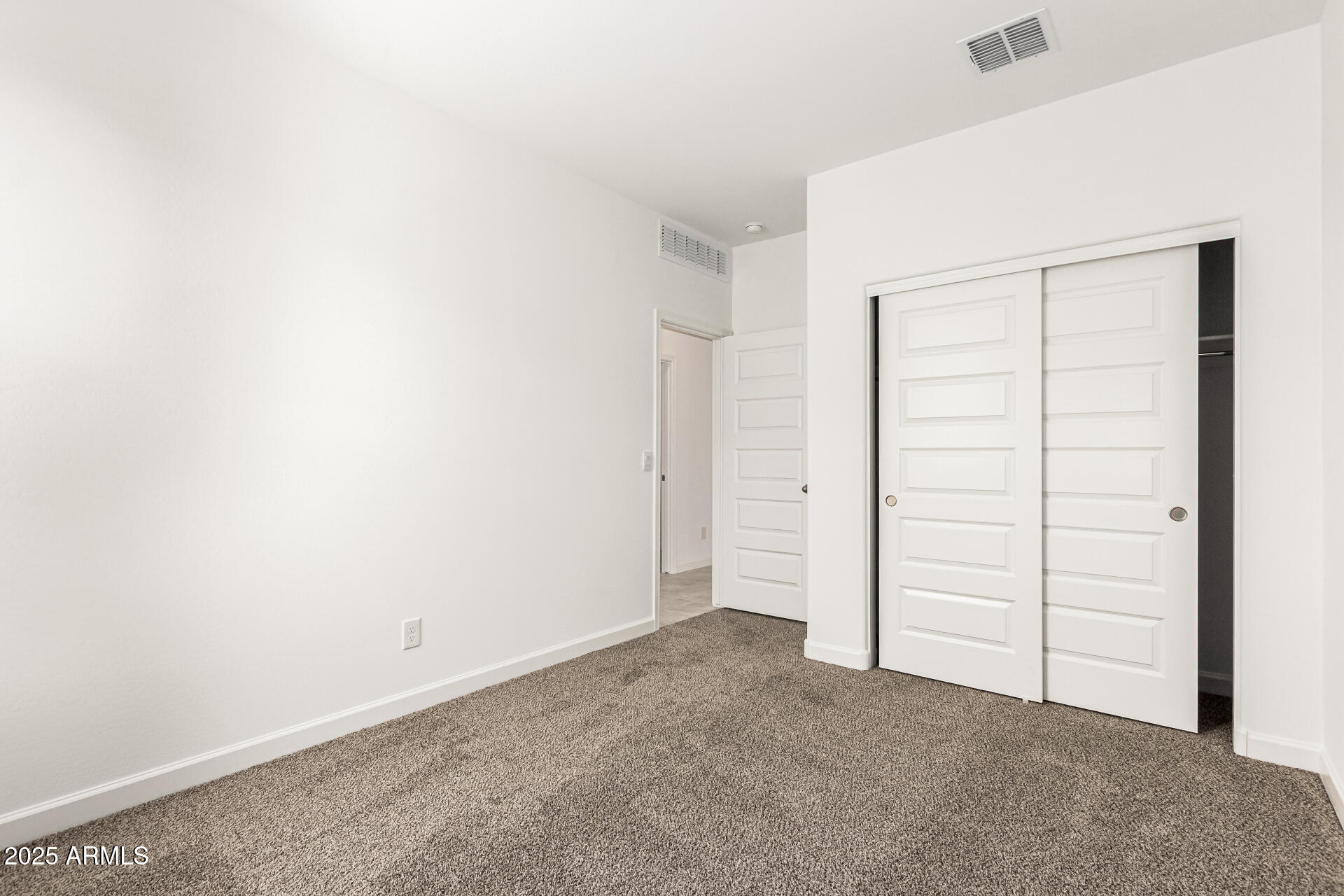 5507 East Mearn Road San Tan Valley, AZ 85140 - Photo 21 of 30 an empty room with closet