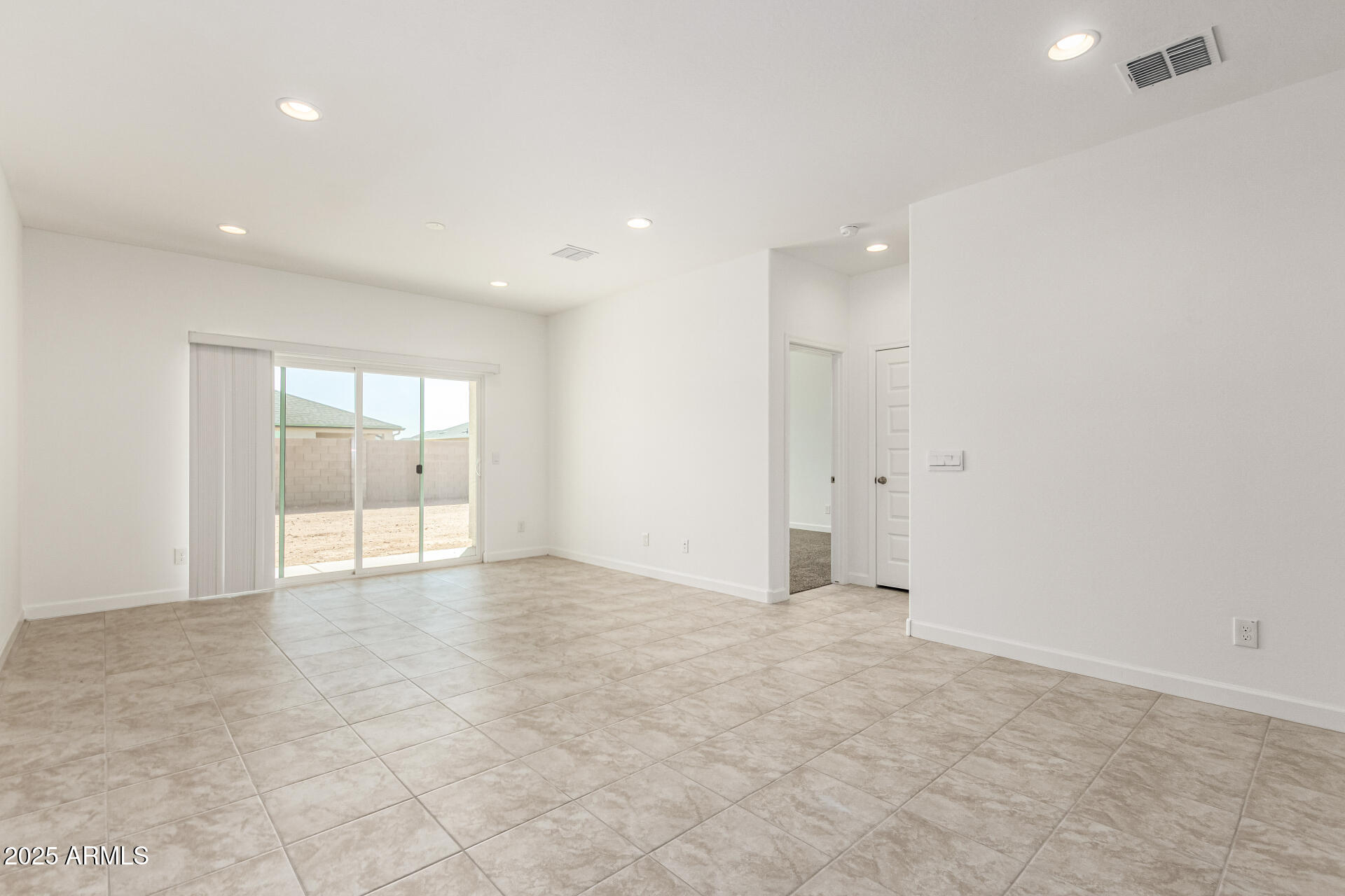 5507 East Mearn Road San Tan Valley, AZ 85140 - Photo 5 of 30 a view of an empty room with glass door
